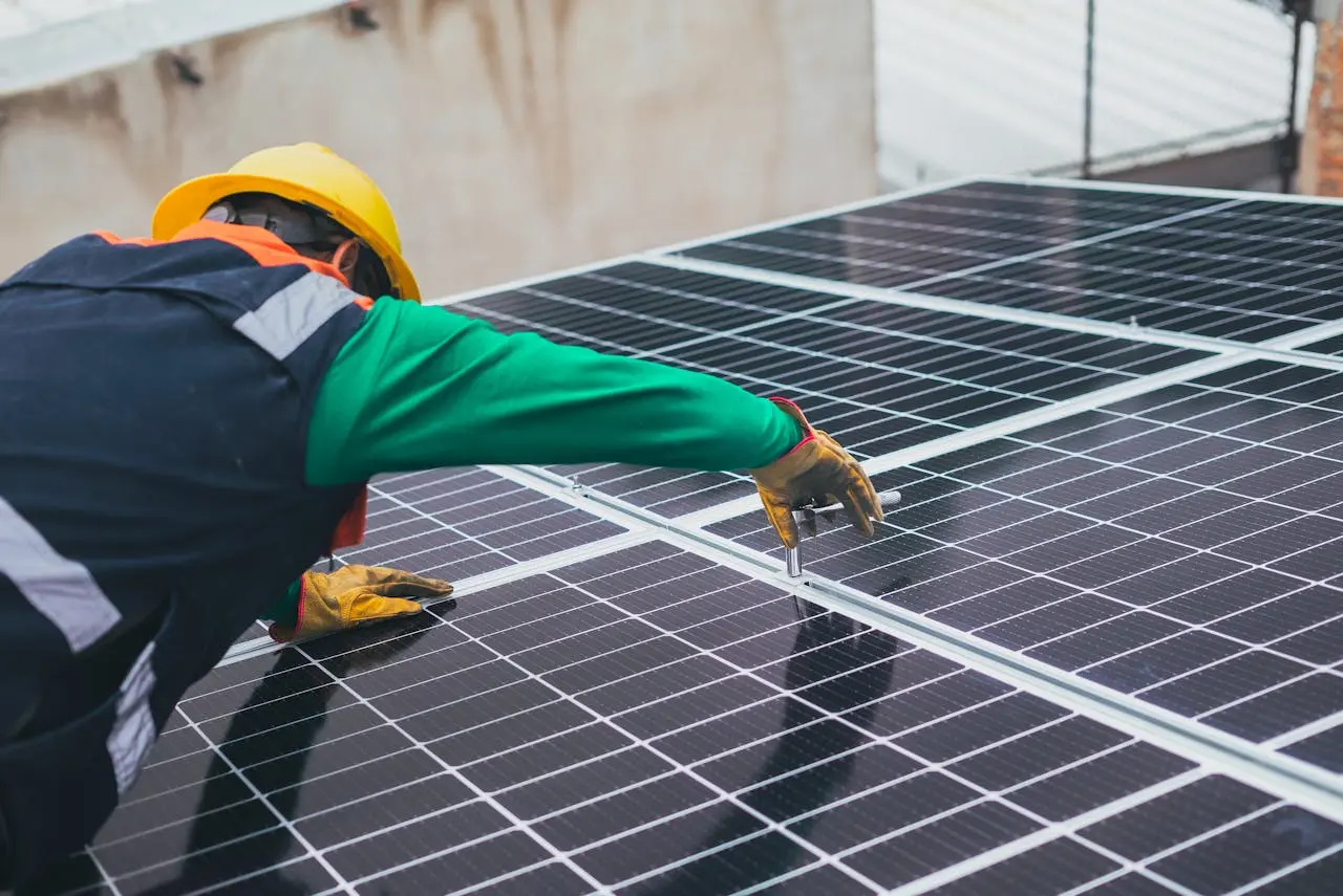 solar-technician-installing-solar-panel